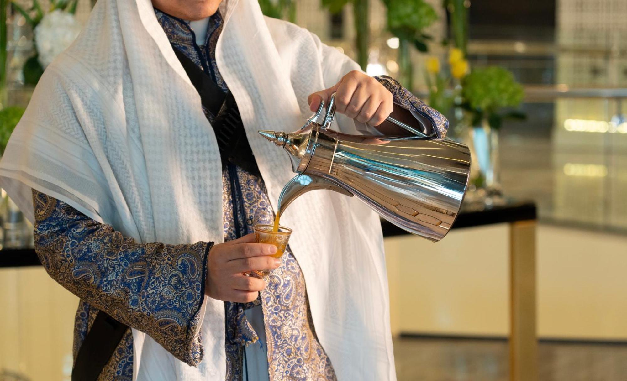 Fairmont Riad Exterior foto Arabic coffee being served